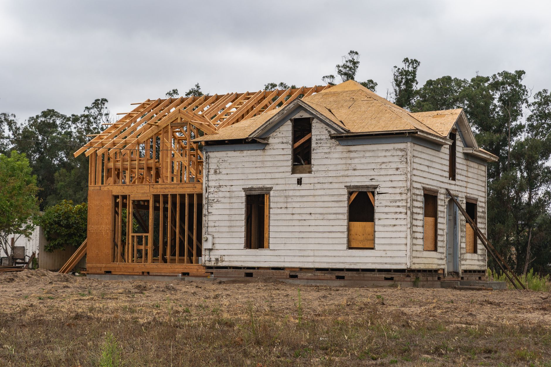 Framing under construction on a rebuilt home lot in a Los Angeles wildfire recovery area